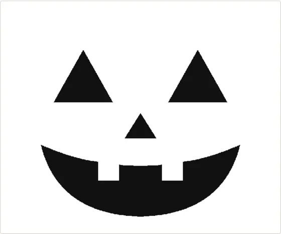 A printed pumpkin stencil with a classic grin, and the lit pumpkin it makes